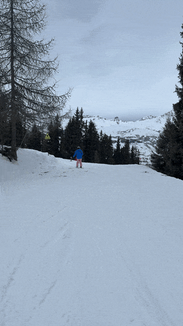 gif of my skiing up a small slope as a beginner